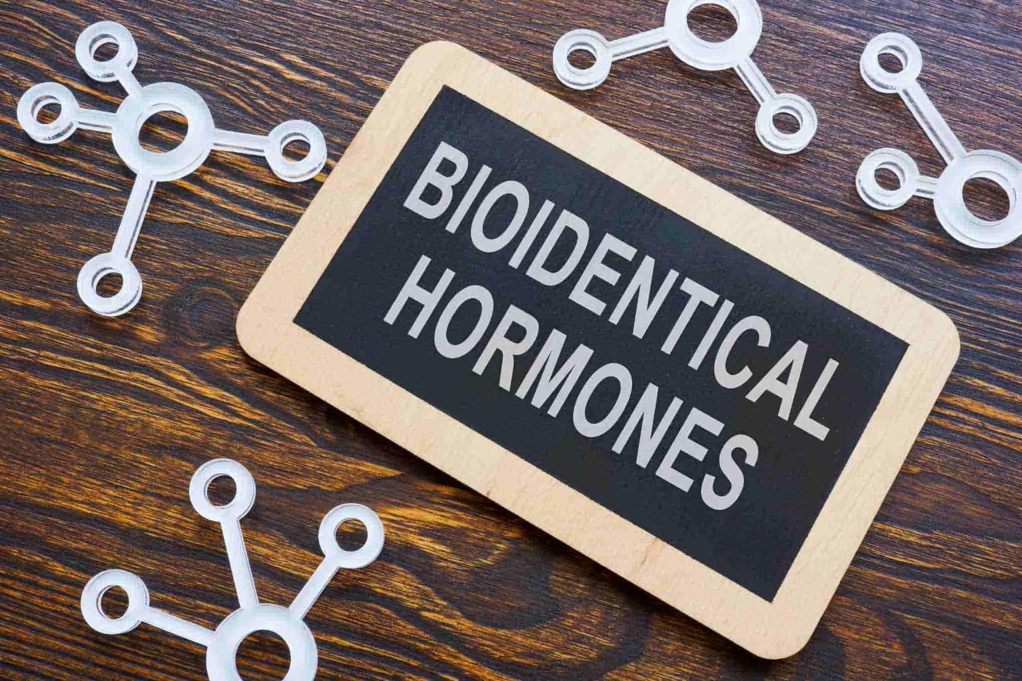 Board with 'Bioidentical Hormones' written on it.